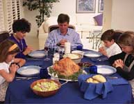 Photo of family eating dinner