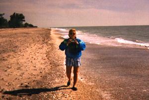 Lady Walking Along a Beach