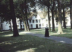 Nun in Courtyard